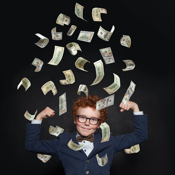 Young Boy Strong Kid Win A Lot Of Money On Black Background