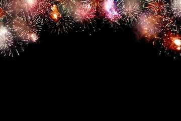 Abstract holiday background with colorful firework on black