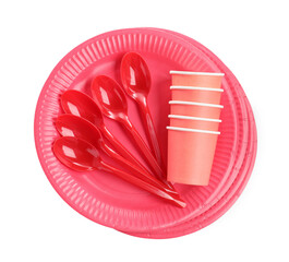 Set of bright disposable tableware on white background, top view