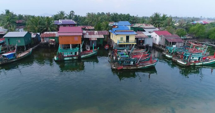 Aerial shot of fishing boats on the Prek Kampong river in the southern part of Kampot city