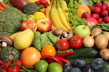 Fototapeta na wymiar Assortment of fresh organic fruits and vegetables as background, closeup