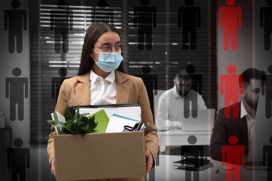 Upset Dismissed Woman Wearing Protective Mask Carrying Box With Personal Stuff In Office