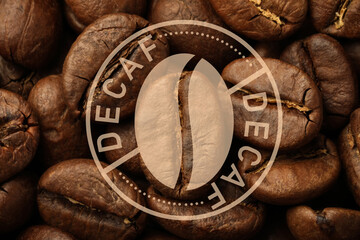 Fototapeta na wymiar Pile of decaf coffee beans as background, closeup