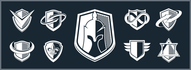 Classic shields shapes set with different additional elements vector symbols set, defense and safety icons, ammo emblems collection.