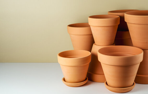 Group of empty ceramic flower pots with copy space
