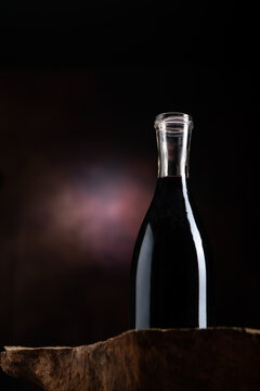A Bottle of Vine on a drak background