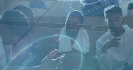 Animation of interface processing data over diverse male sports team talking in dressing room - Powered by Adobe