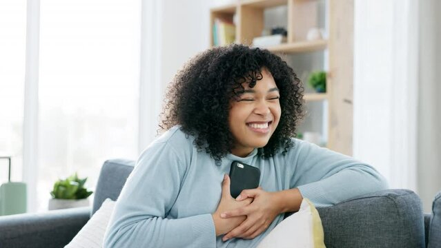 Happy, in love and satisfied woman with a phone receiving good news, love message or sweet text on a dating app. One cheerful and young female online on social media looking at a cute notification