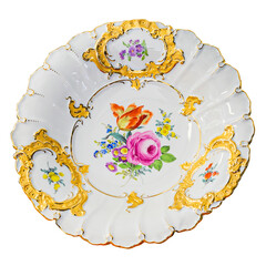 Vintage plate with flower pattern and golden decorations on white background.