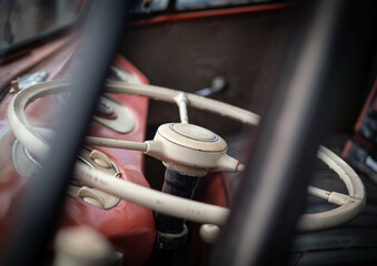 Dashboard and steering wheel of old-timer car