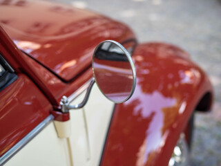 The old-timer car  in sunlight.