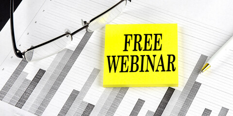 Word FREE WEBINAR on yellow sticky on the chart background