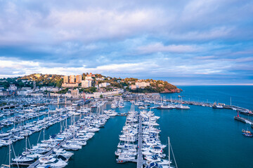 Sunset over Torquay Harbour and Marina, English Riviera from a drone, Devon, England, Europe	