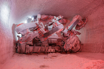 Drilling machine in deep salt mine.
