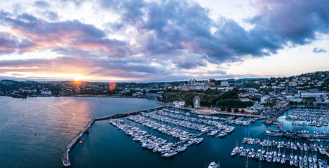 Sunset over Torquay Harbour and Marina, English Riviera from a drone, Devon, England, Europe	