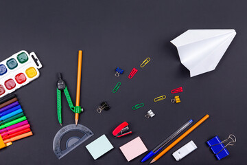 School background top view School items on a black background