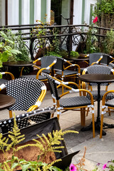 Empty tables in outdoor cafe in summer