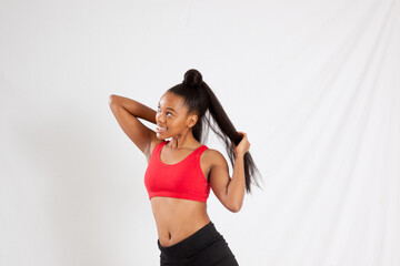 Fototapeta premium Happy woman in an exercise outfit