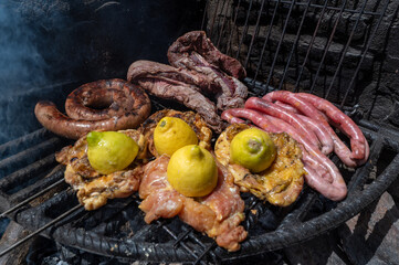 Typical Uruguayan and Argentine Asado Cooked on fire. Entrana and Vacio meat cuts. Accompanied with Chorizo.
