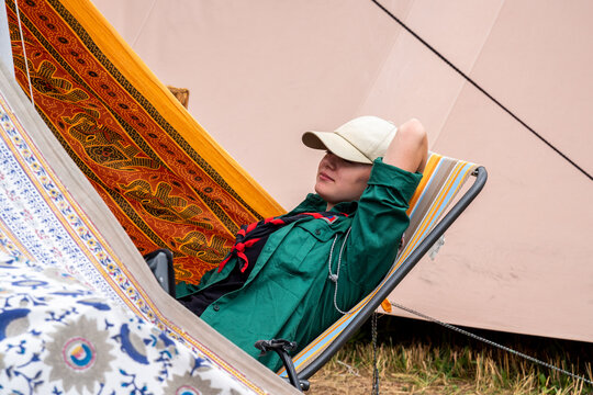 Girl Scout Leader In A Campsite On A Break