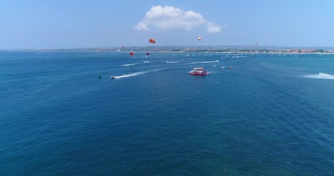 Aerial shot of parasailing in the southern part of Serangan island
