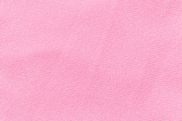 The Clothing Pink color fabric texture background, top view of cloth textile surface