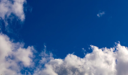 Clouds in dramatic blue sky.