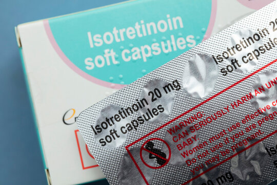 LONDON, UK - August 2022: packs of isotretinoin or roaccutane tablets used to treat severe acne
