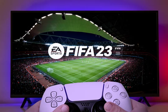 Kid play FIFA 23 with Playstation 5 controller , 4 aug, 2022, Sao Paulo,  Brazil. Stock Photo | Adobe Stock