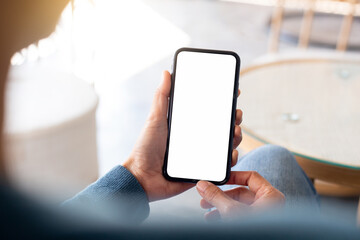 cell phone blank white screen mockup.hand holding texting using mobile on desk at office.background empty space for advertise.work people contact marketing business,technology