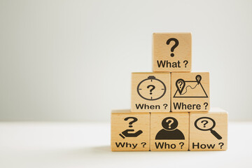 5W1H Analytical thinking with 5W1H,Root cause analysis concept.,What,When,Where,Why,Who,How text and icon on wooden cube over white background with copyspace.