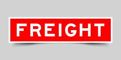 Sticker label with word freight in red color on gray background