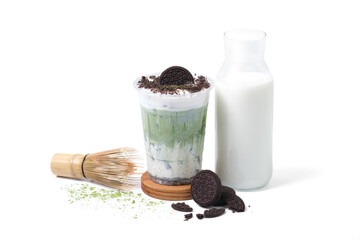 ice green tea milk shake cookie with matcha powder and Matcha bamboo whisk isolated on white...