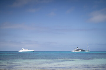 Two ships boats in the beautiful sea of Formentera