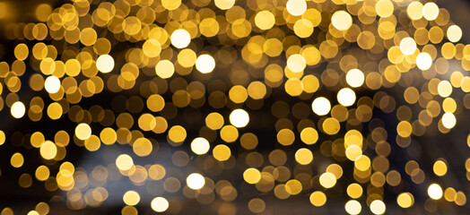 defocused golden abstract christmas background, yellow lights bokeh banner