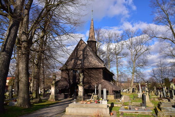 Fototapeta na wymiar Wooden Cemetery Church of Our Lady Virgin Mary, Broumov