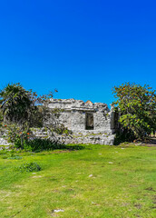 Ancient Tulum ruins Mayan site temple pyramids artifacts seascape Mexico.