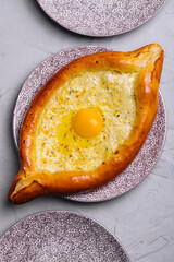 Georgian cuisine ajaruli khachapuri - georgian bread with egg and cottage cheese