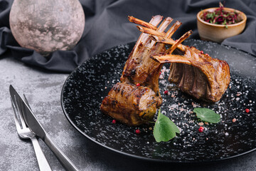 Beautifully grilled lamb rib chop steaks on plate