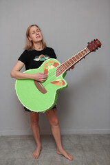 Fototapeta premium woman with guitar