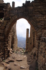 Ruins of abandoned ghost village Gamsutl at top of mountain peak in Dagestan, North Caucasus