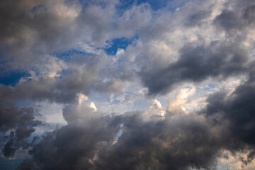 Naklejka na ściany i meble Blue sky with voluminous clouds