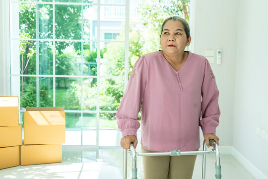 Grandmother practiced walking using walkers at home care.