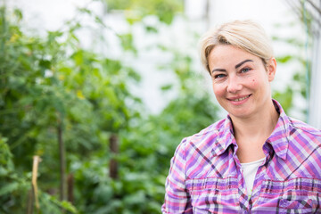 Portrait of pretty young farmer woman.