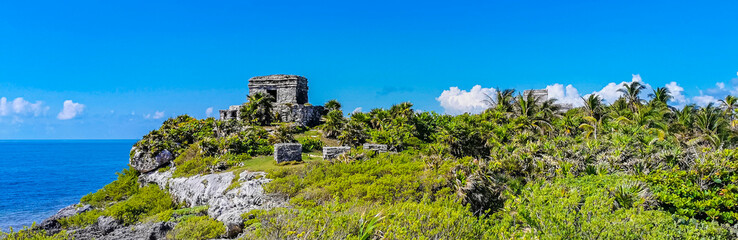Ancient Tulum ruins Mayan site temple pyramids artifacts seascape Mexico.