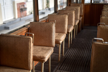 Interior detail with elegant seats of a vintage tramway