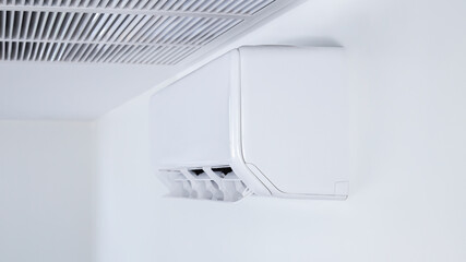 split type air conditioner wall hanging white background