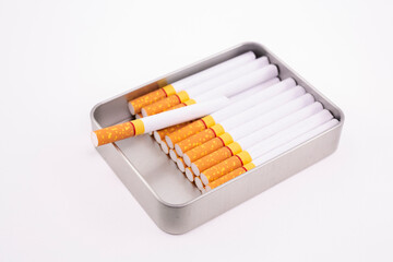Cigarette in metal box. smoking cigarettes . cigarette filter tubes