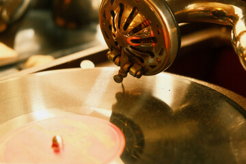 Close-up of a gramophone record. Close-up of a turntable for vinyl discs. Gramophone needle and head © Shevchenko Oleksandr