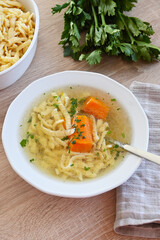 Turkey broth with noodles in a bowl